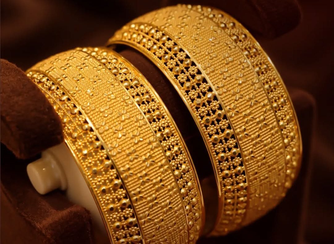 Pair of intricately crafted gold bangles